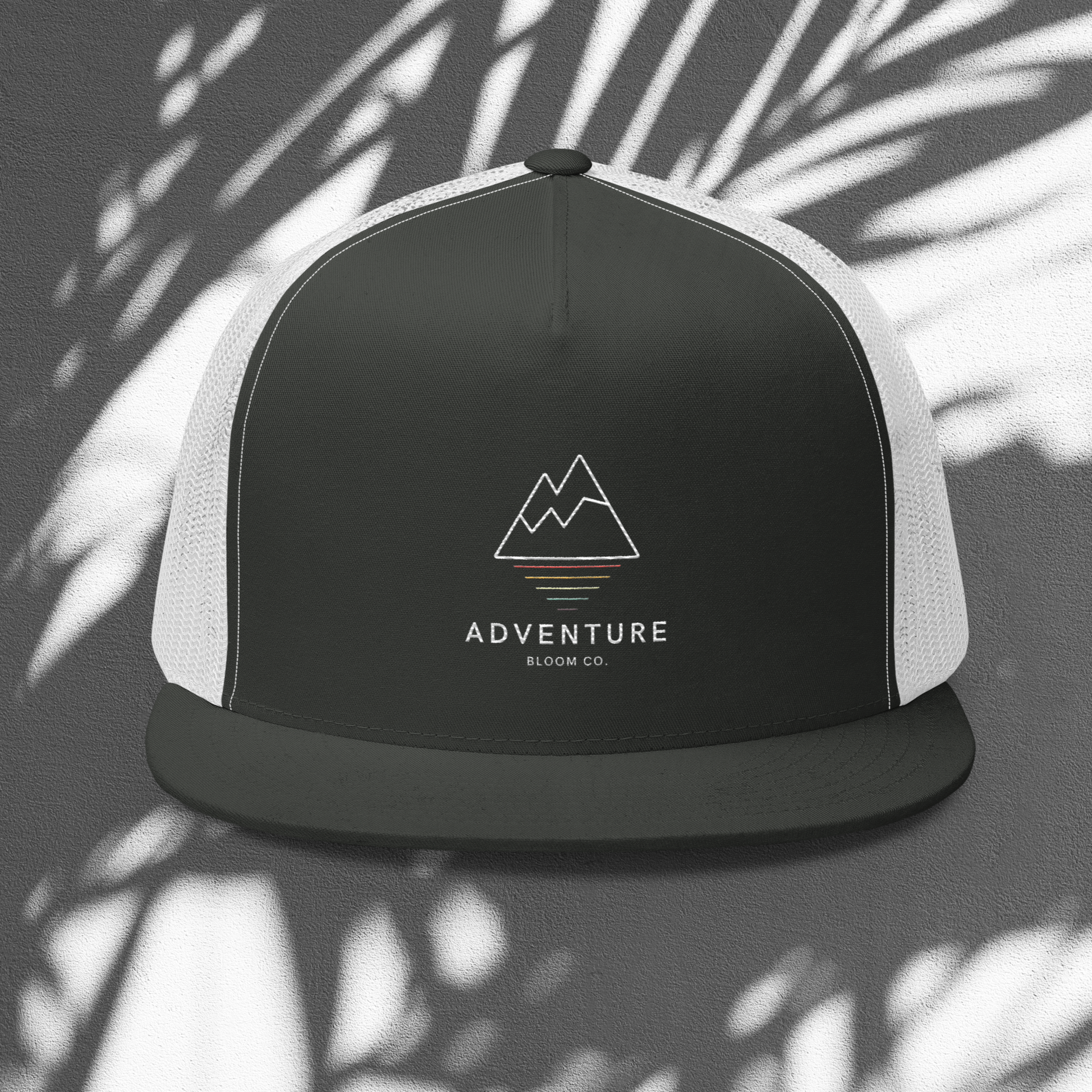 Summit Seeker Trucker Cap in Charcoal and White: Elevate Your Adventure Style.