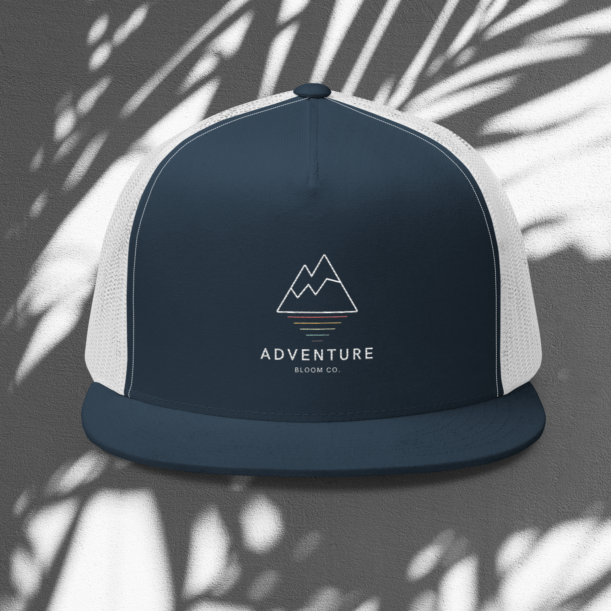 Summit Seeker Trucker Cap in Navy and White: Elevate Your Adventure Style.