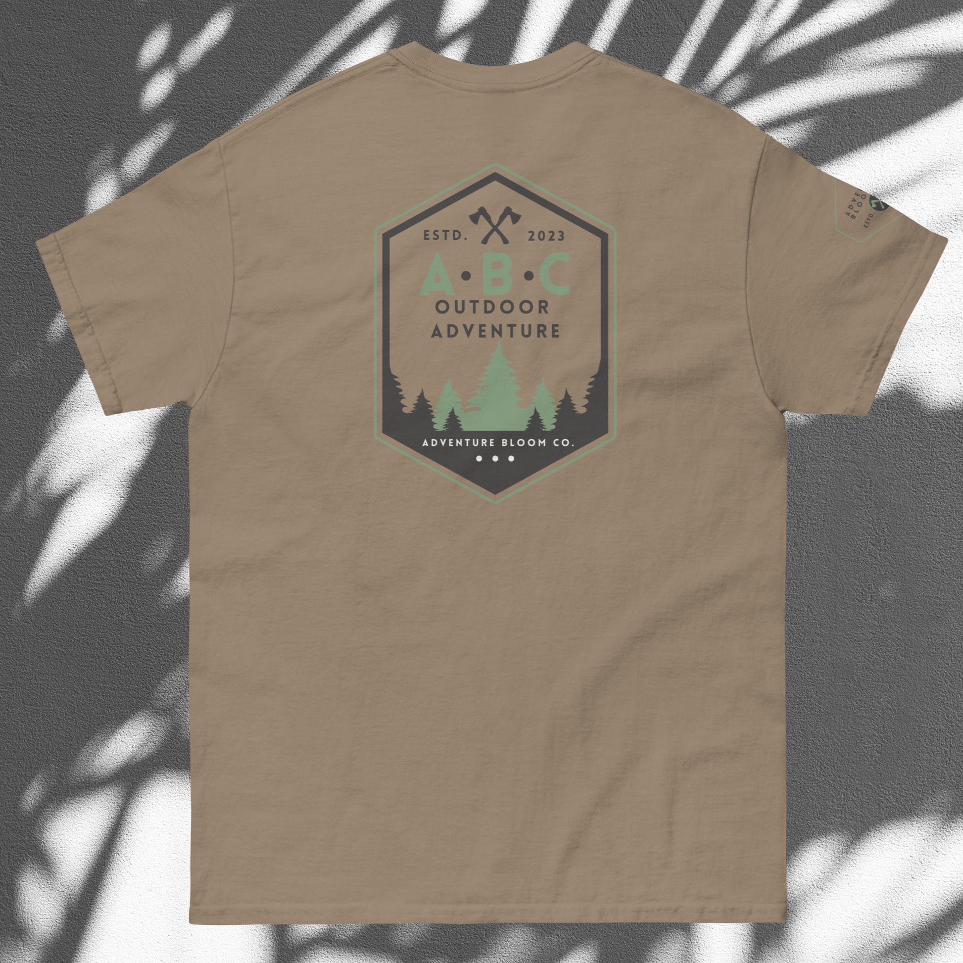 Lay Flat View of Adventure Bloom Co. Axe-Masters Adventure Tee in Brown Savana