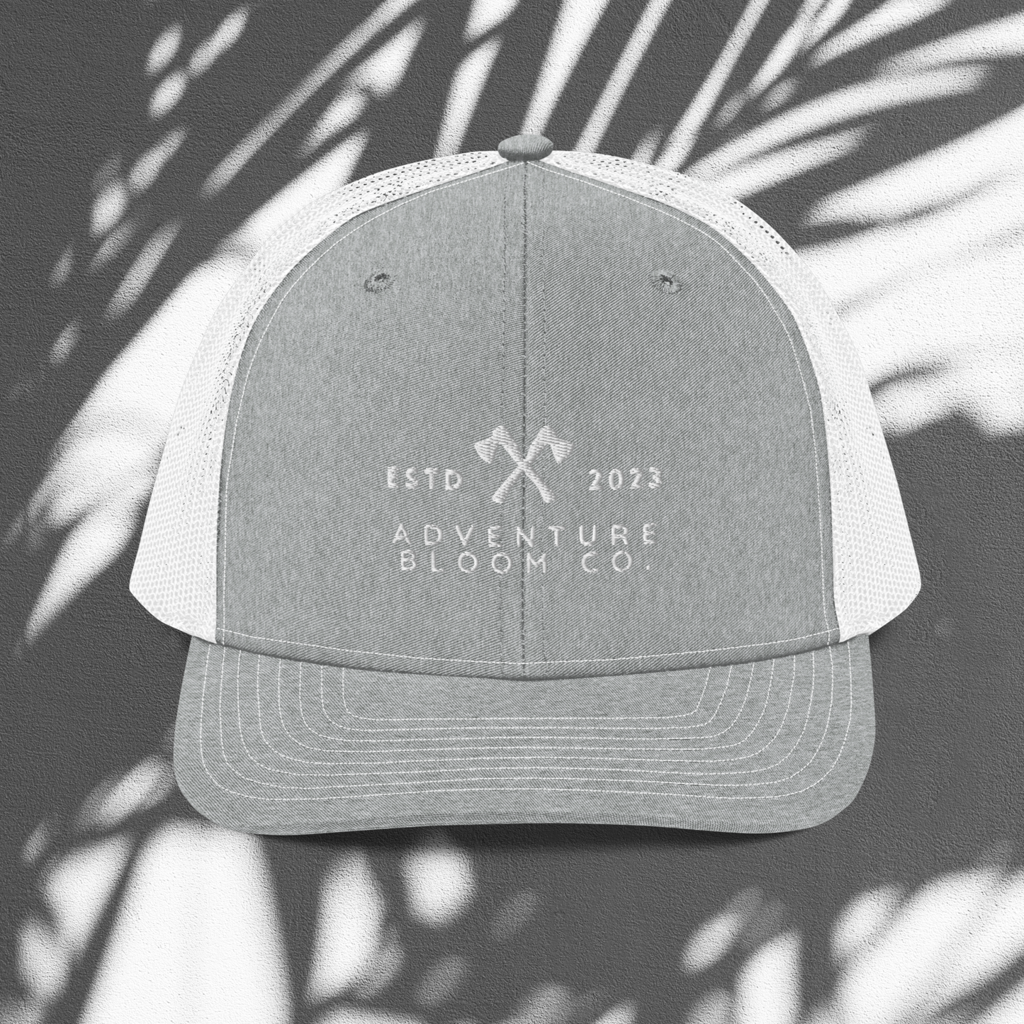 Axe-Masters Trucker Cap in Heather Grey with an adventure-themed design.