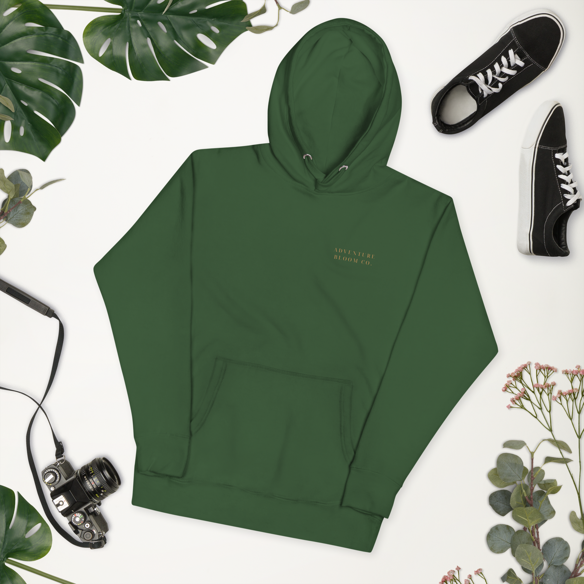 Lay flat shot of Growth-Inspired Ladies' Hooded Sweatshirt in Forest Green – Adventure Bloom Co.