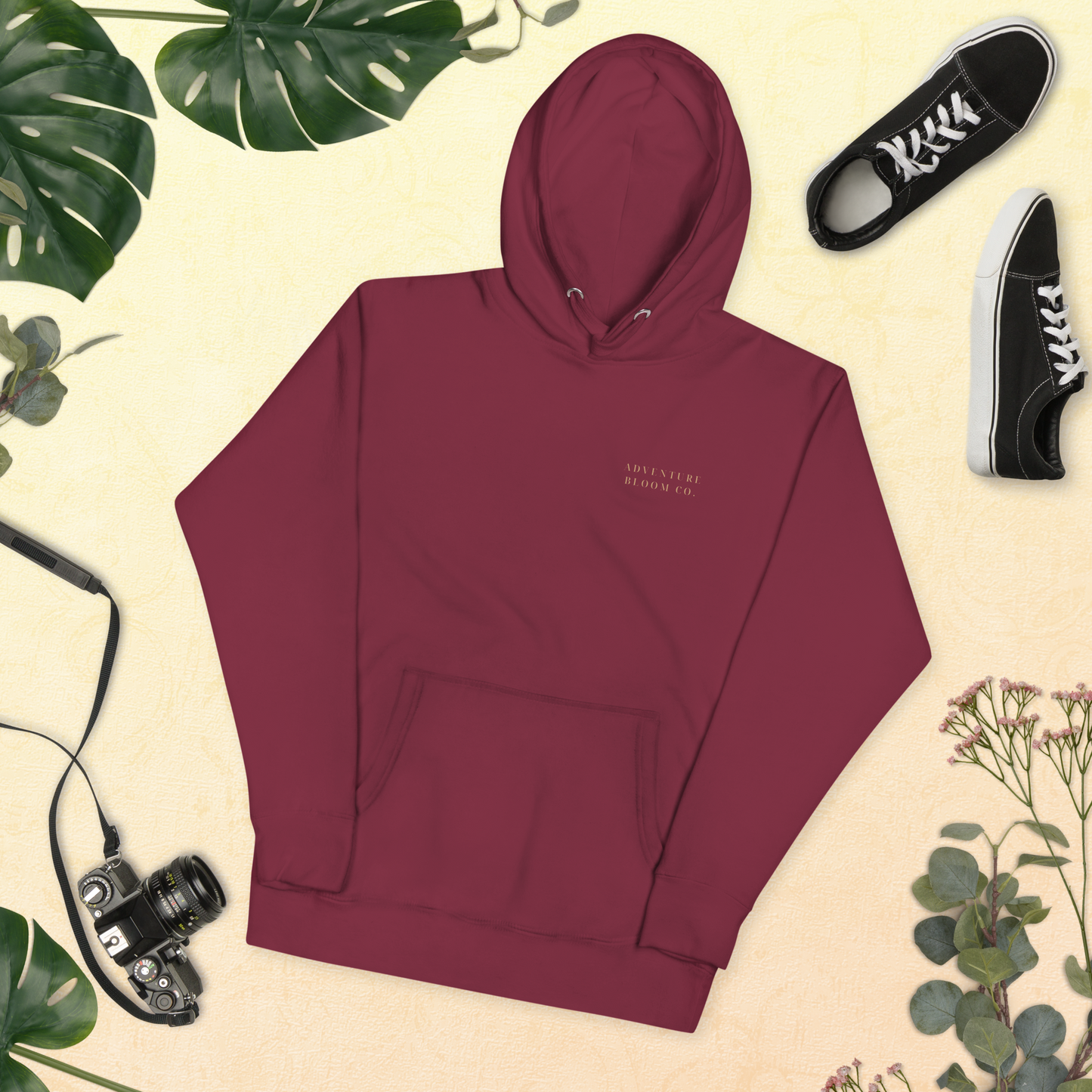 Lay flat shot of Growth-Inspired Ladies' Hooded Sweatshirt in Marroon – Adventure Bloom Co.