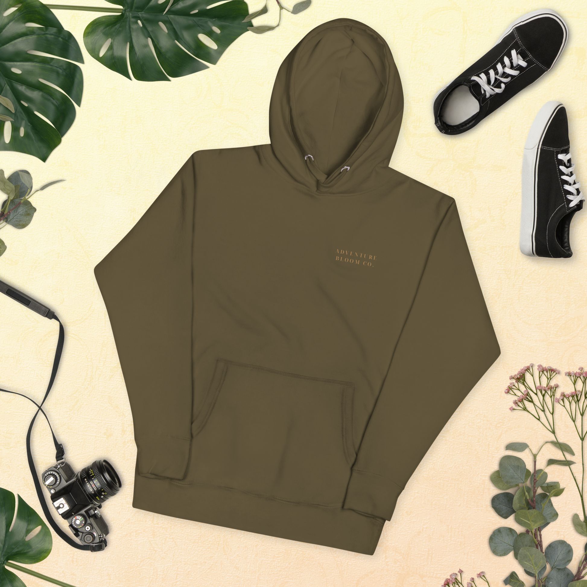 Lay flat shot of Growth-Inspired Ladies' Hooded Sweatshirt in Military Green – Adventure Bloom Co.