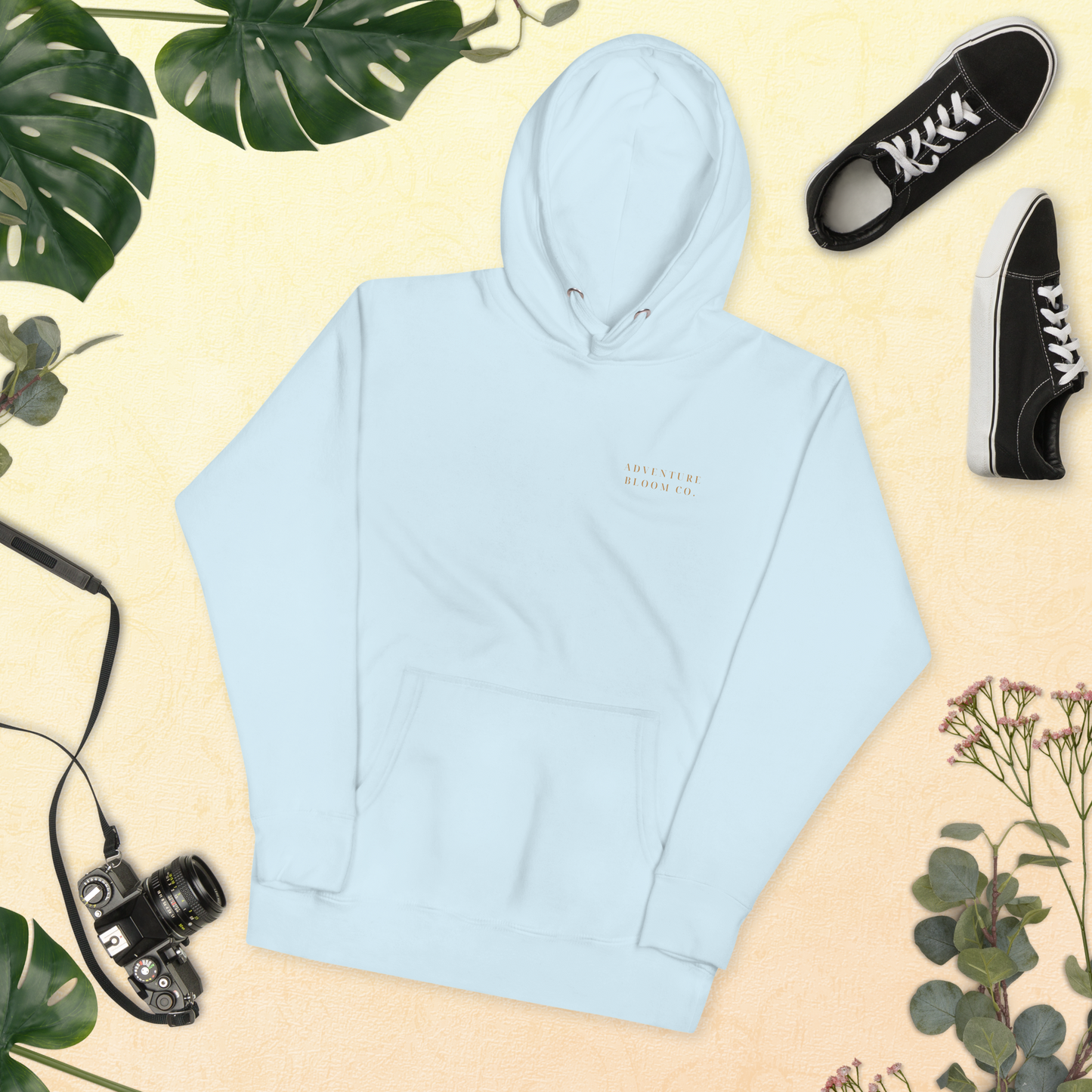 Lay flat shot of Growth-Inspired Ladies' Hooded Sweatshirt in Sky Blue – Adventure Bloom Co.