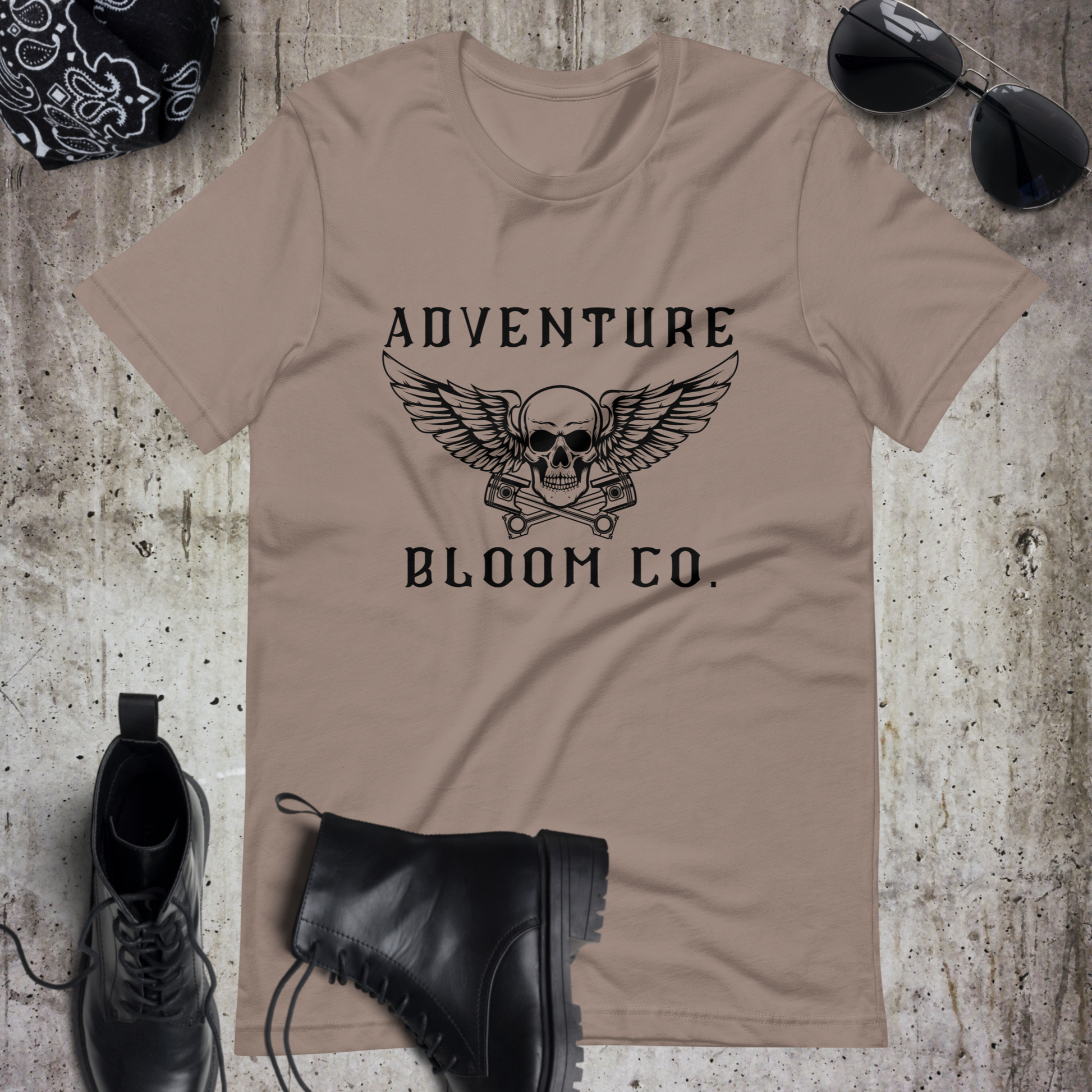 Bold design of Adventure Bloom Co.'s Tee in Pebble, symbolizing the fearless spirit of motorcycle adventures