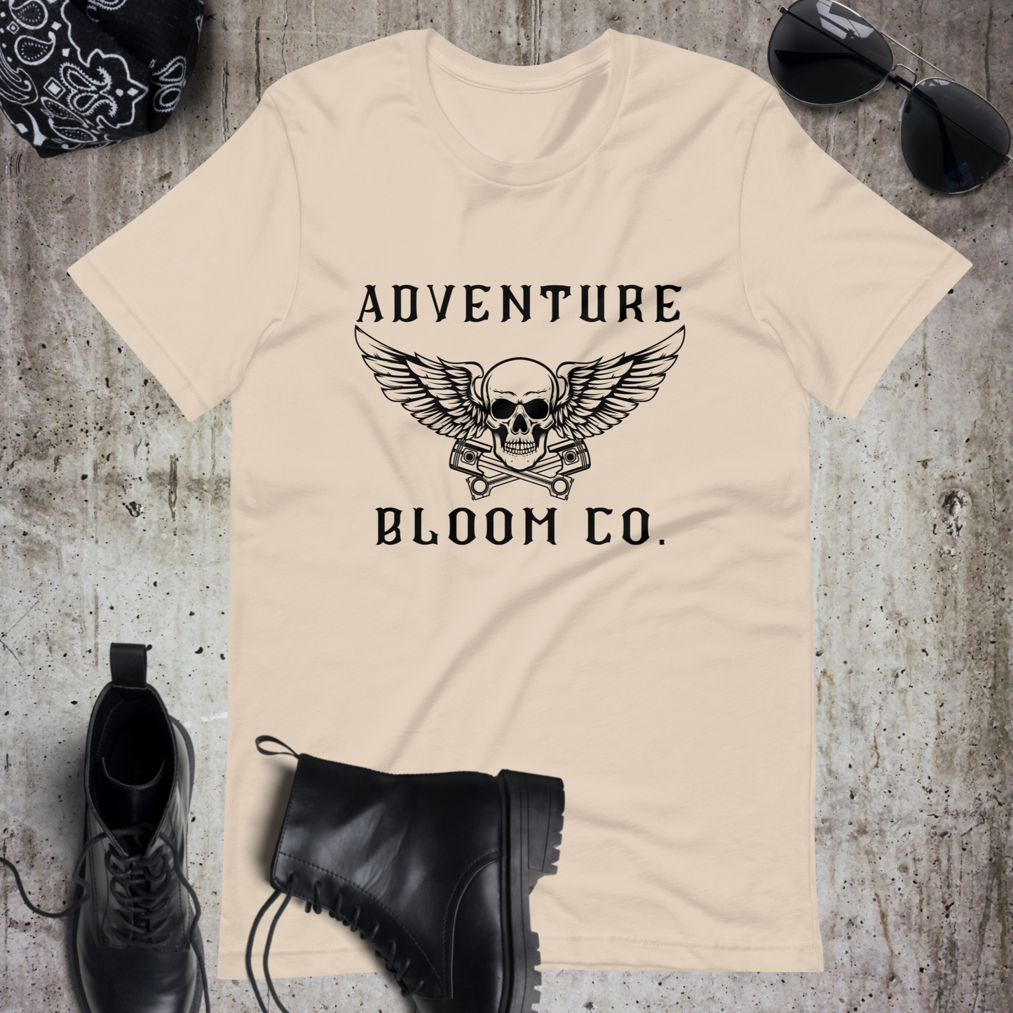 Bold design of Adventure Bloom Co.'s Tee in Soft Cream, symbolizing the fearless spirit of motorcycle adventures