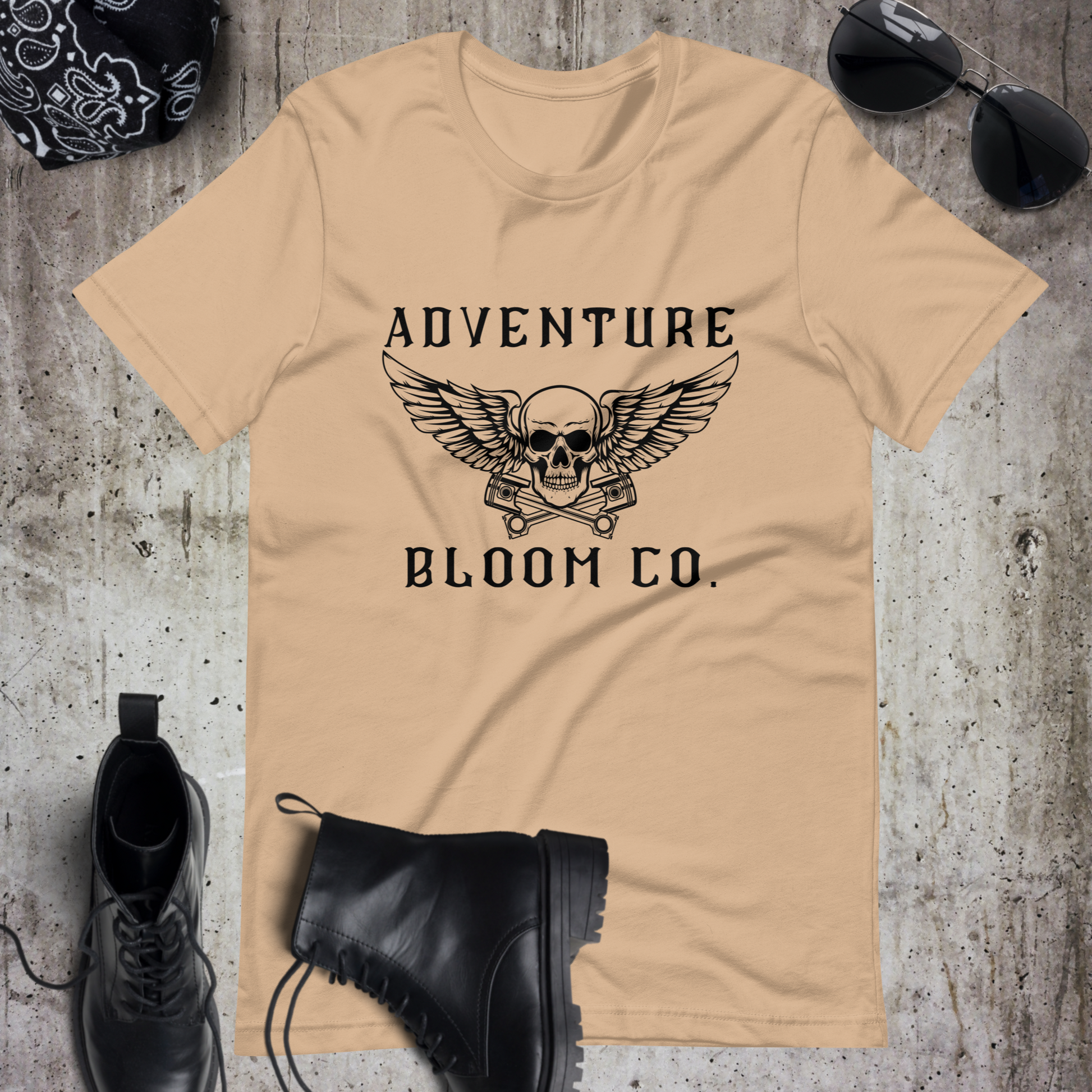 Bold design of Adventure Bloom Co.'s Tee in Tan, symbolizing the fearless spirit of motorcycle adventures